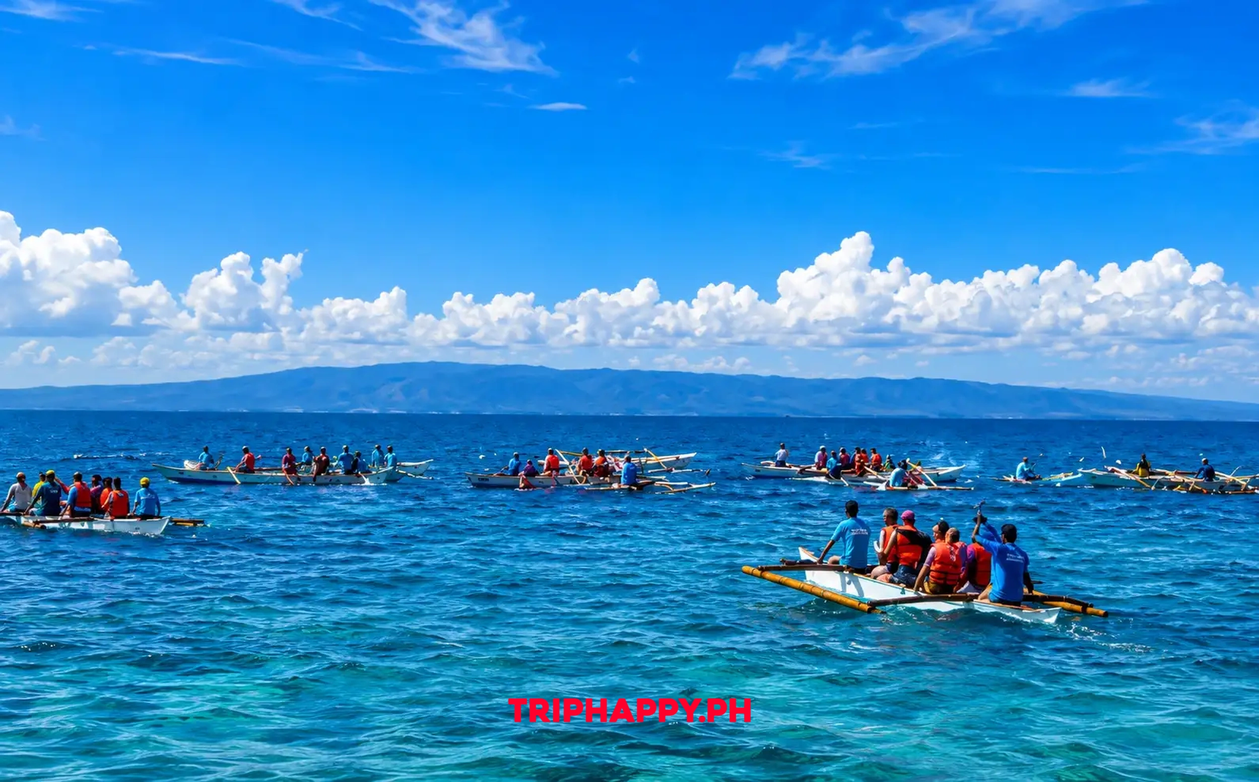 Tour boats and visitors enjoying the clear blue waters of Cebu