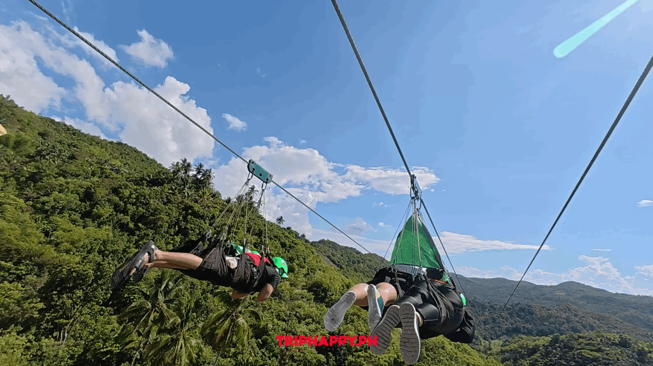 Guests riding the optional zipline to the Kawasan canyoneering starting point.