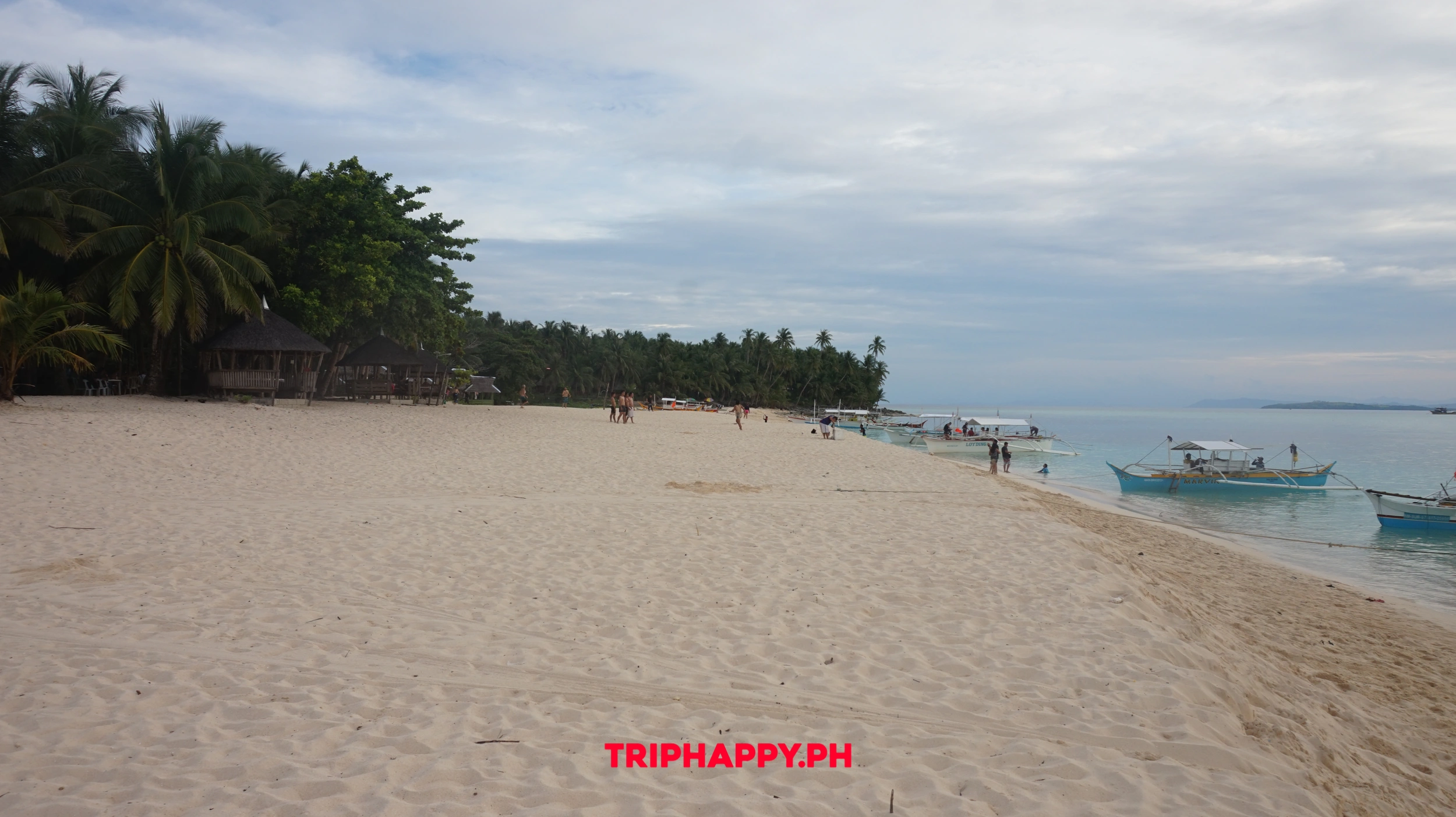Explore the island's scenic shoreline and tropical surroundings.