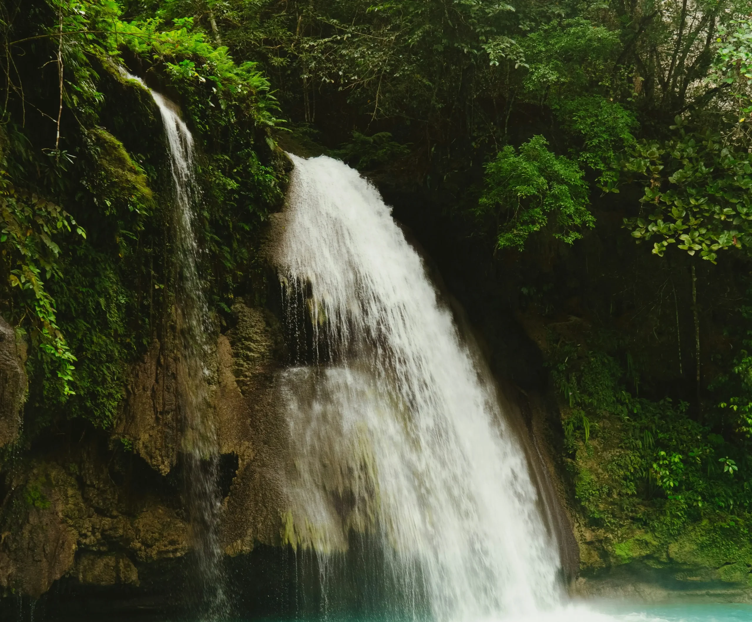 Scenic view of the iconic Kawasan Falls waterfall in Cebu.