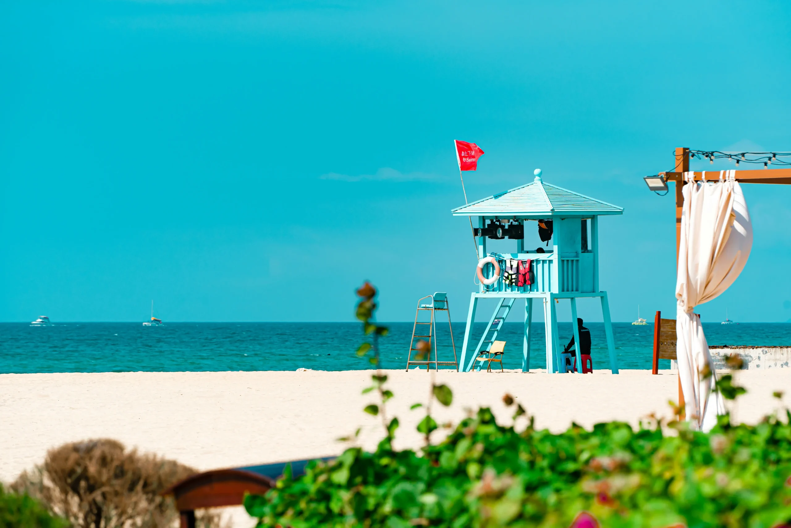 Hainan seaside landscape with lighthouse and turquoise water